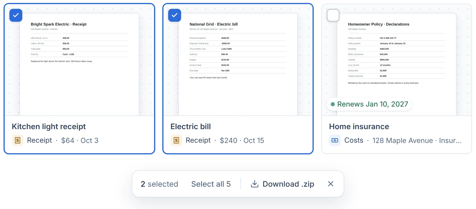 Files at Maple House as cards, each with a preview: the kitchen light receipt and the electric bill picked, and the home insurance marked Renews Jan 10, 2027; a bar under them reads 2 selected, Download .zip.